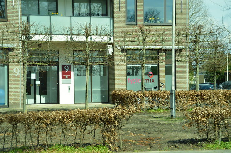 Medical taping rond de enkel na een sportblessure.